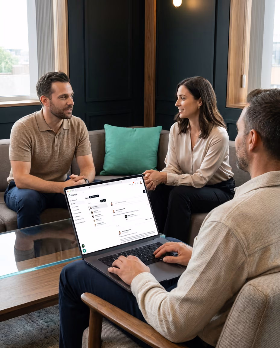 Three people working together at a table
