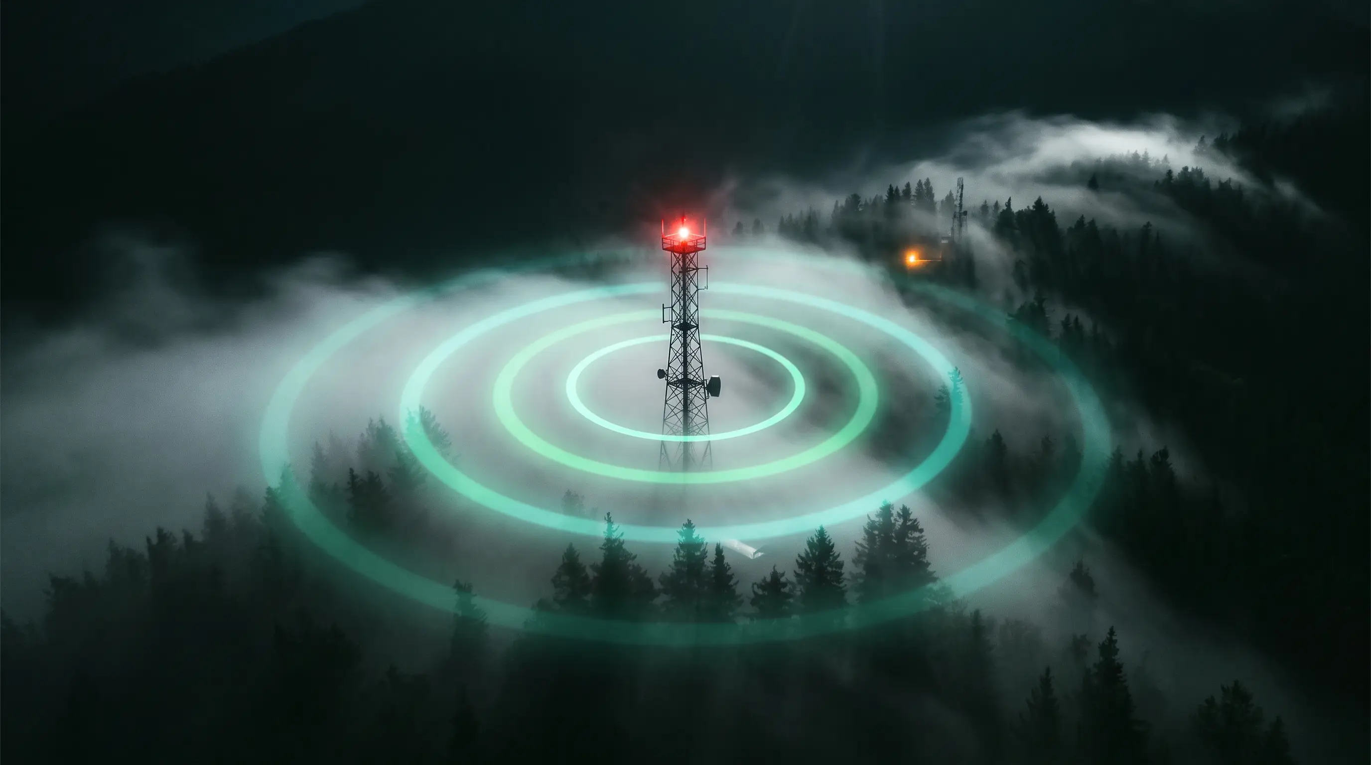 A radio tower broadcasting into fog, the signal dissipating before it lands
