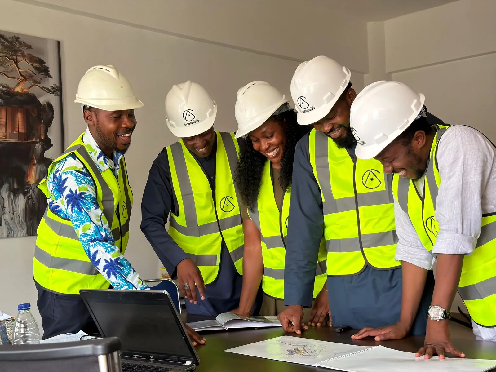 Project managers reviewing plans at an active job site