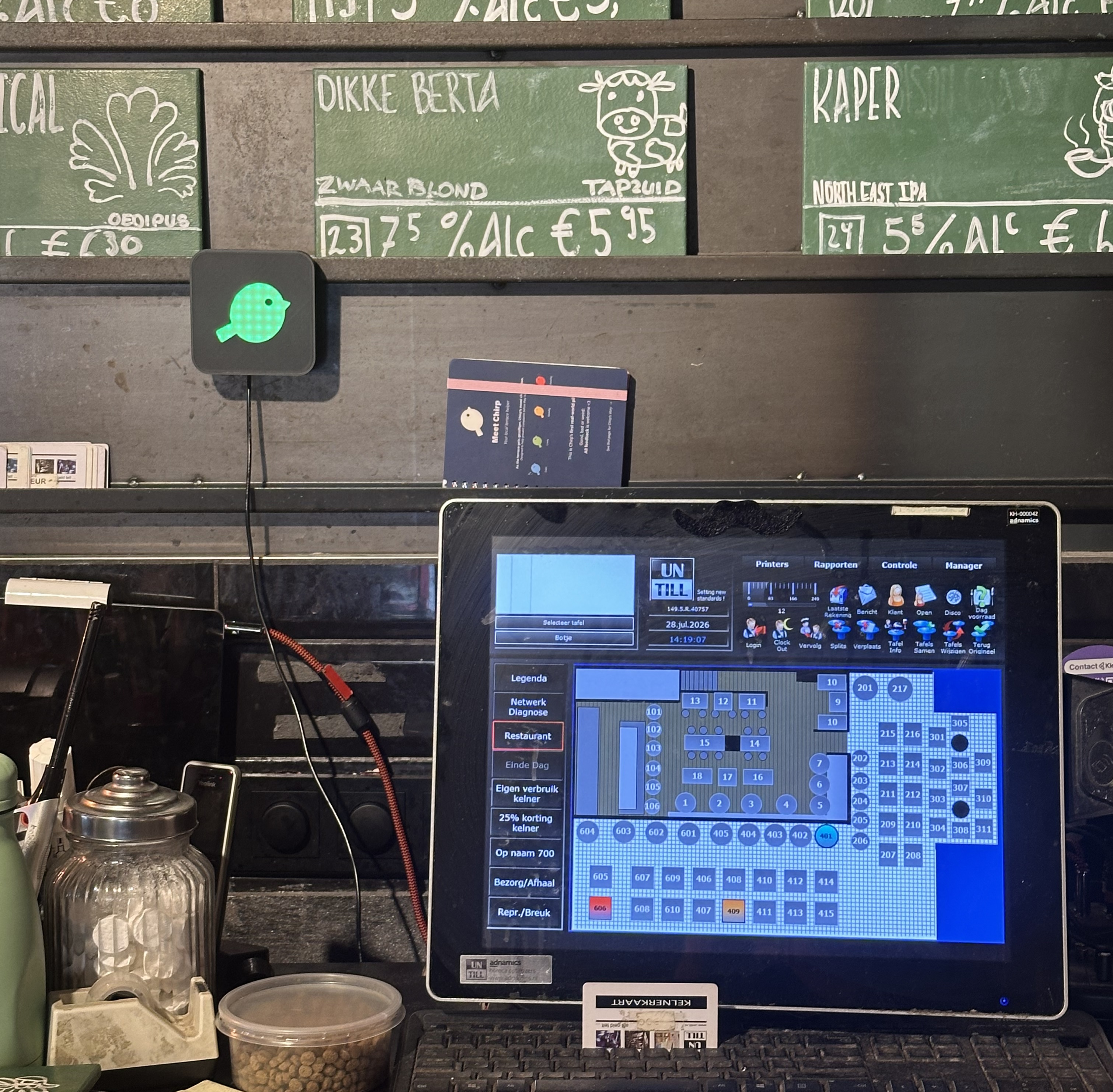Chirp mounted above the register in a bar