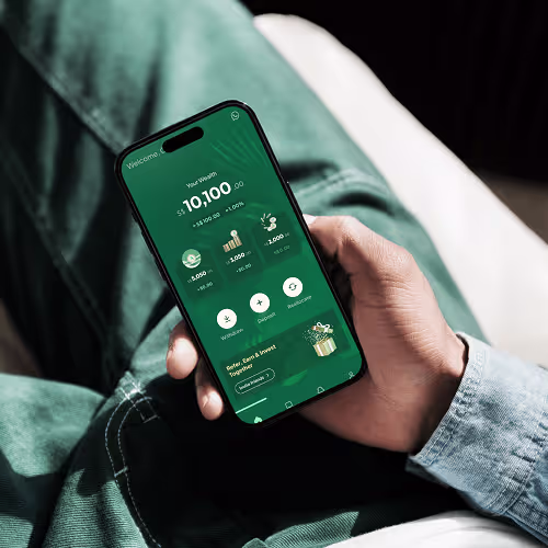 A hand holding a mobile phone showing the dollar role strategy interface.