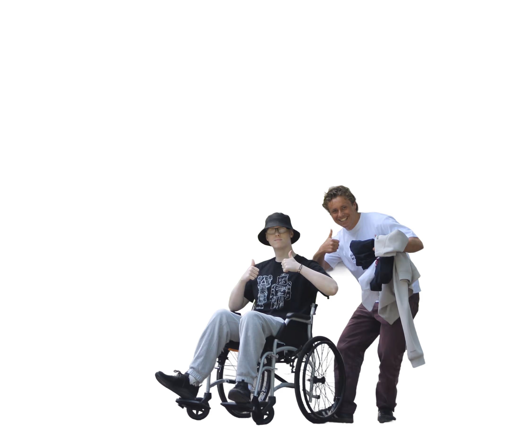 Two people smiling and giving thumbs up; one in a wheelchair wearing a bucket hat, the other standing with clothes.