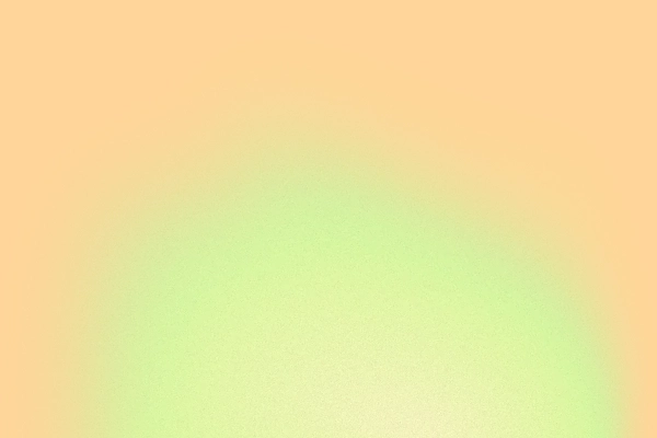 Blurred gradient background with soft transitions between peach and light green colors.
