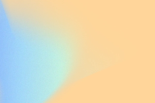 Abstract gradient background blending blue, green, and peach colors smoothly.