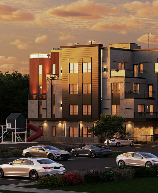 Modern apartment building at sunset with parked cars and a children's playhouse with slide nearby.