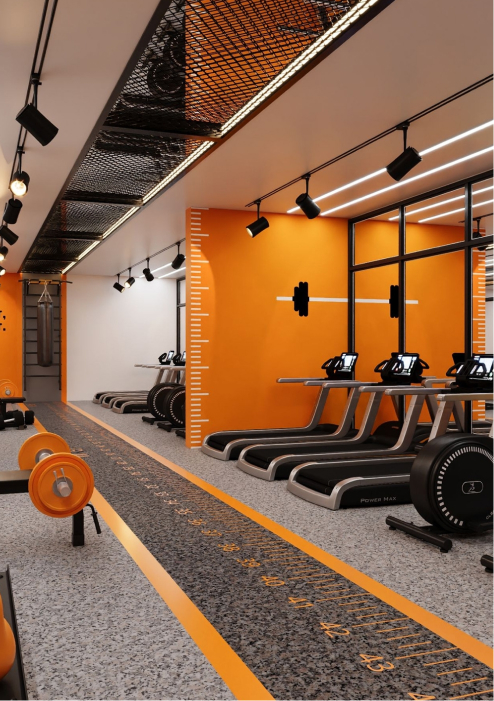 Modern gym with orange walls, treadmills, weight machine, and a floor ruler for measuring distance.