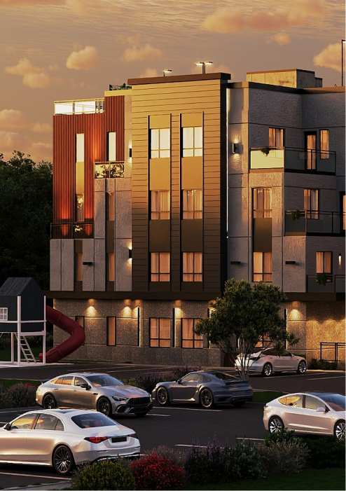 Modern apartment building at sunset with parked cars and greenery around.