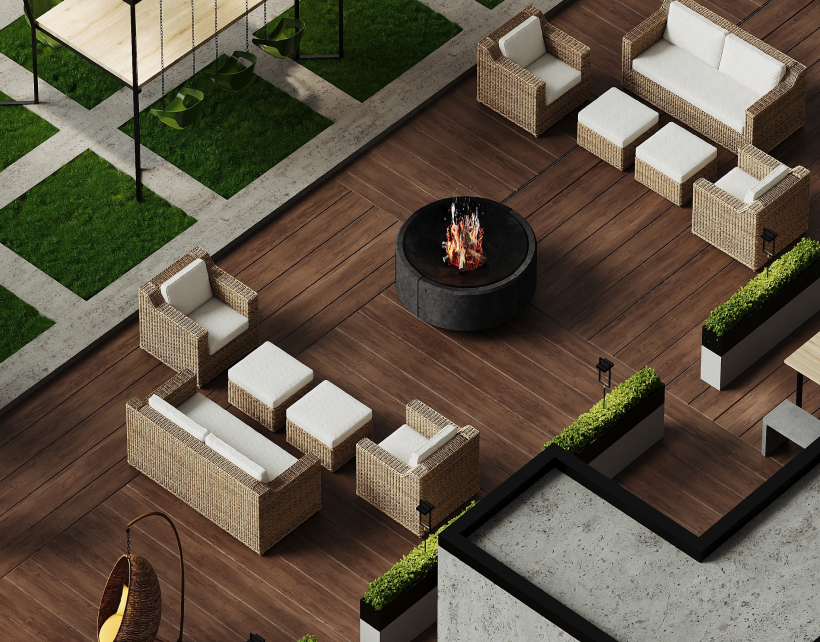Outdoor patio with wicker sofas, armchairs, footstools, and a central fire pit on wooden flooring.