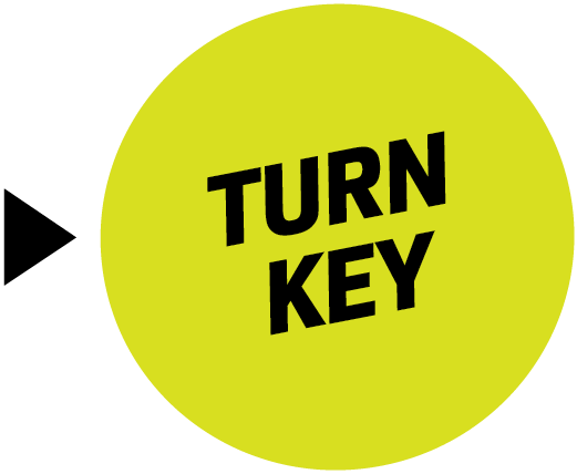 Bright yellow-green circular badge with the bold black text 'TURN KEY' angled diagonally across the center.