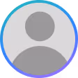 Generic gray user avatar icon with a circle background and blue outline.