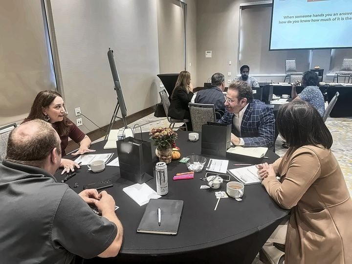 Glenn working a scenario at a table