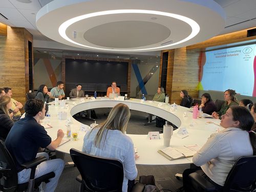 Glenn Llopis leading a General Mills leadership cohort around one table