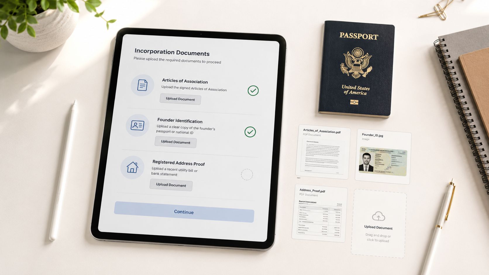 A digital tablet displaying an incorporation document upload checklist next to a passport and paperwork.