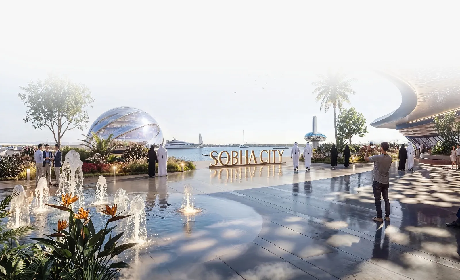 Modern outdoor plaza with water fountain features and domed architecture at a luxury real estate development