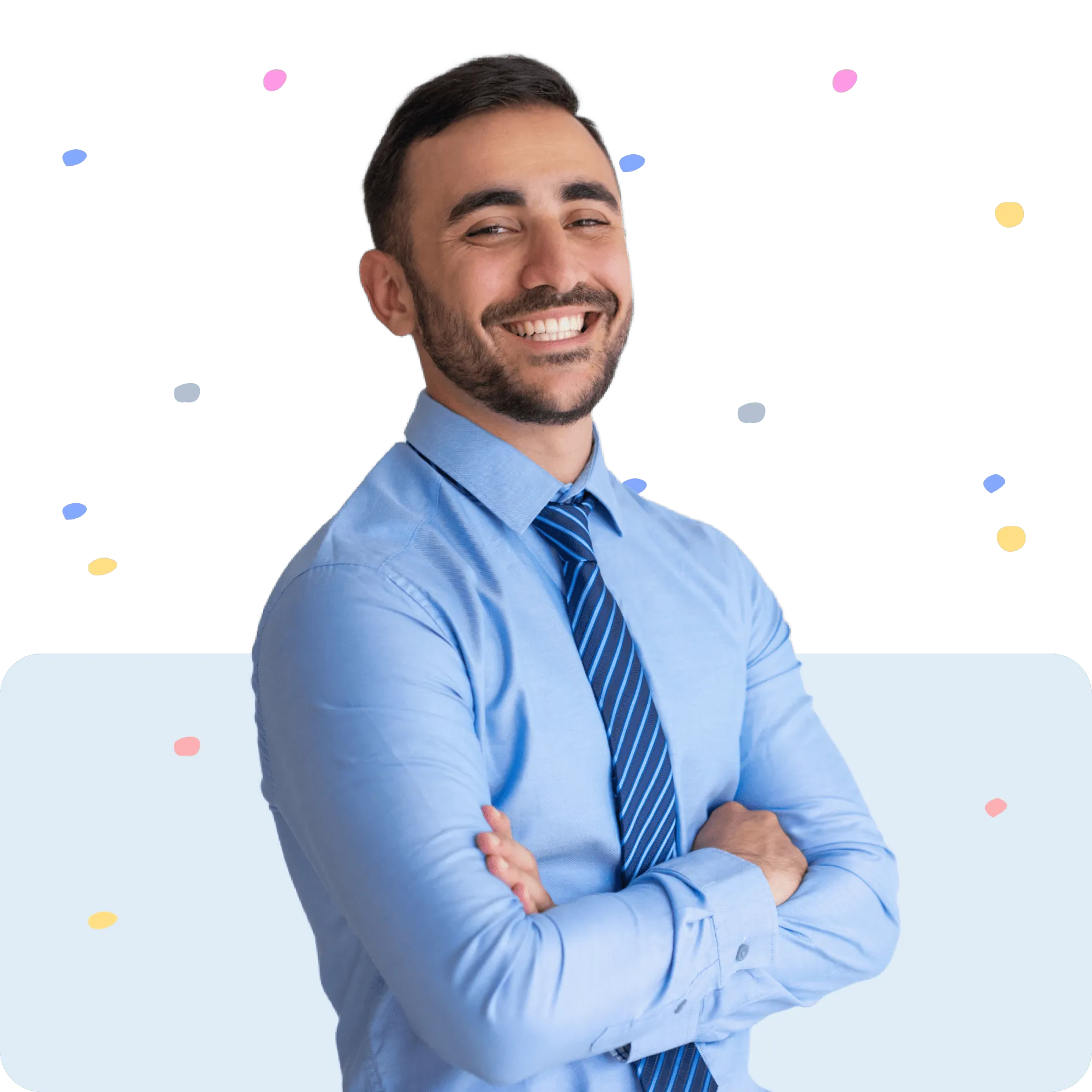 Smiling man in light blue shirt and striped tie with arms crossed on colorful confetti background.
