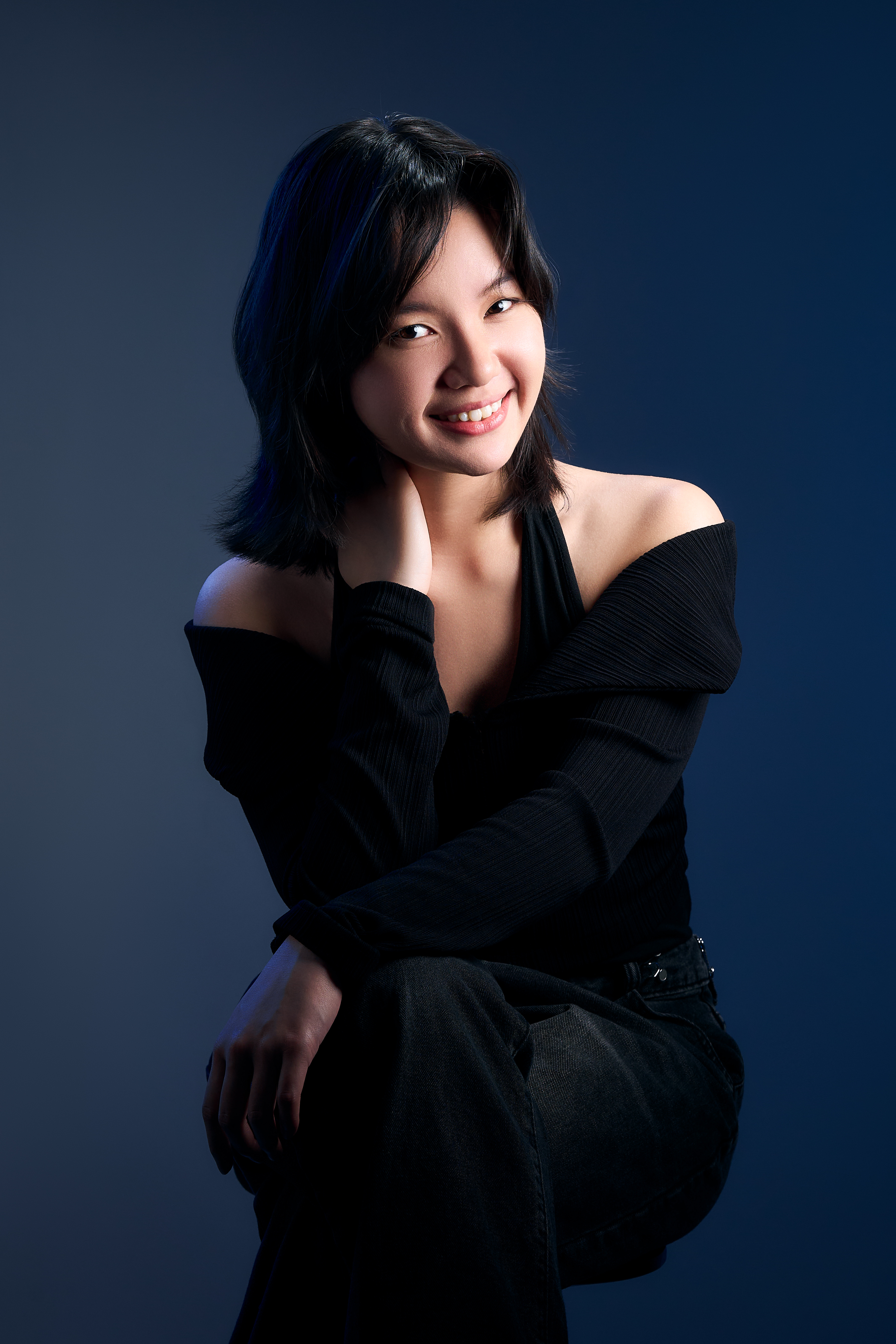Professional headshot of Rachel Chew Ray Peng Motion Pixels videography team Singapore
