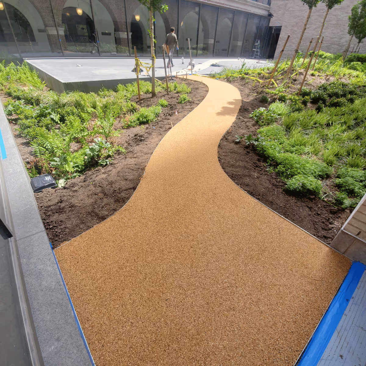 Rubber stone over concrete