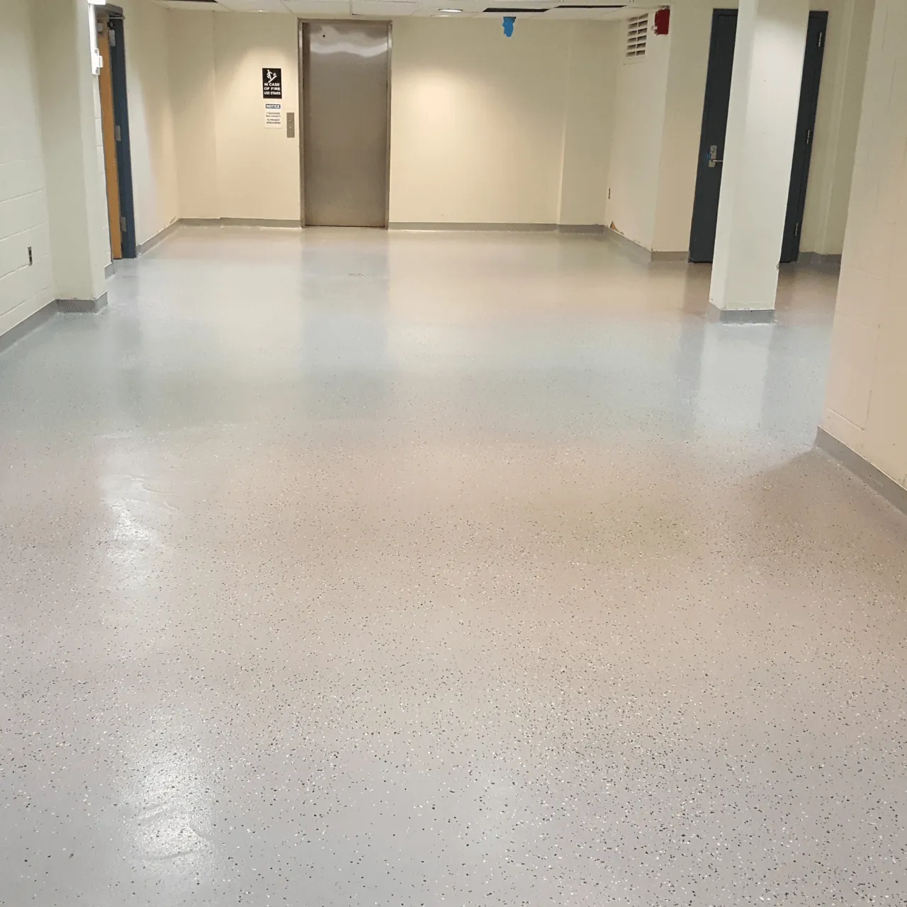 Light flake epoxy floor in a hallway