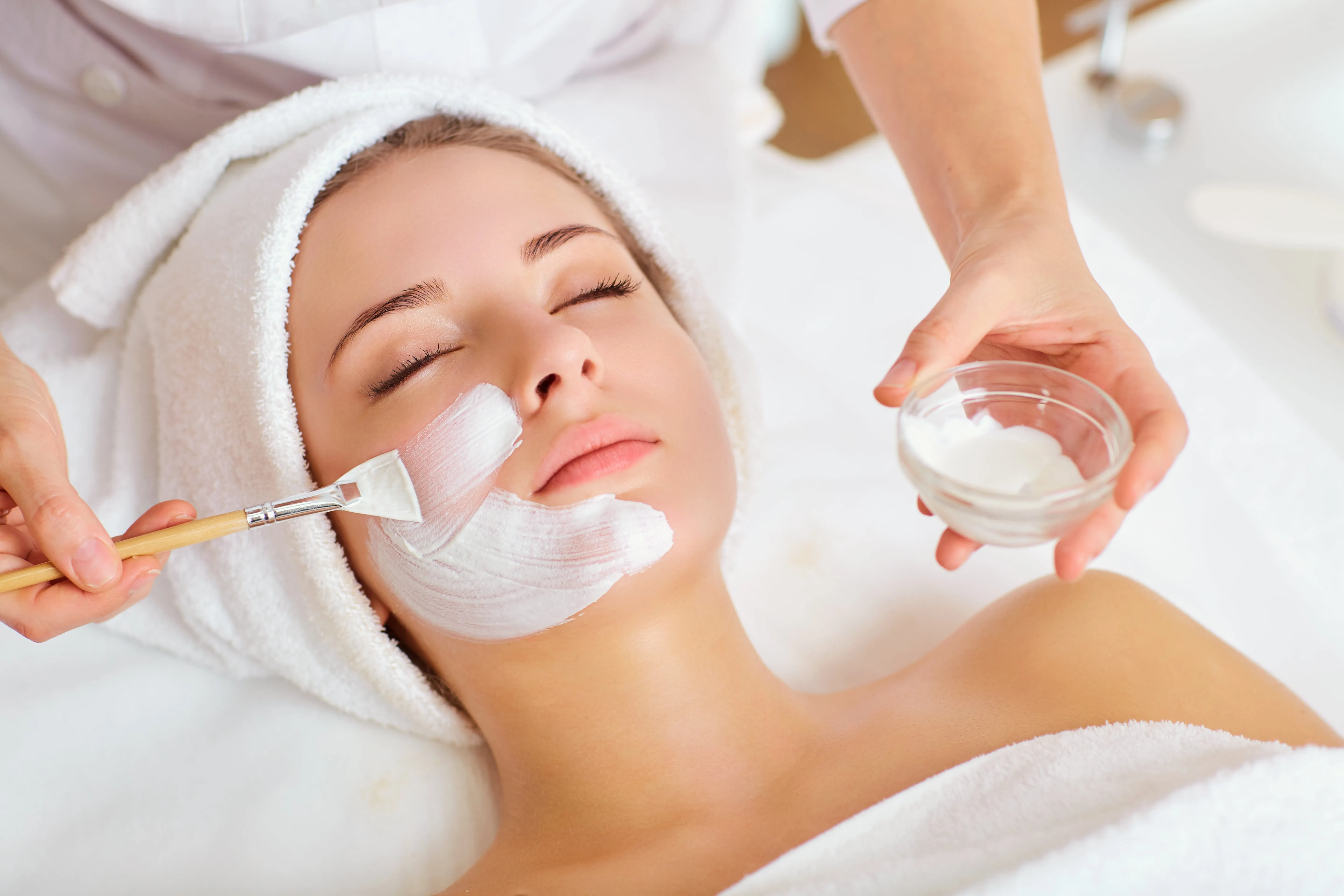 woman receiving a face massage