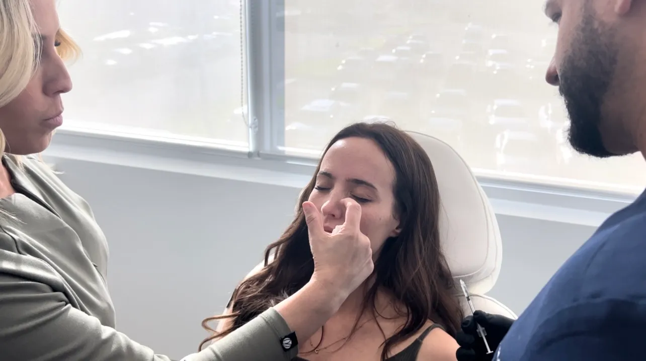 Woman receiving aesthetic treatments taught by Dr. Linette Rivera