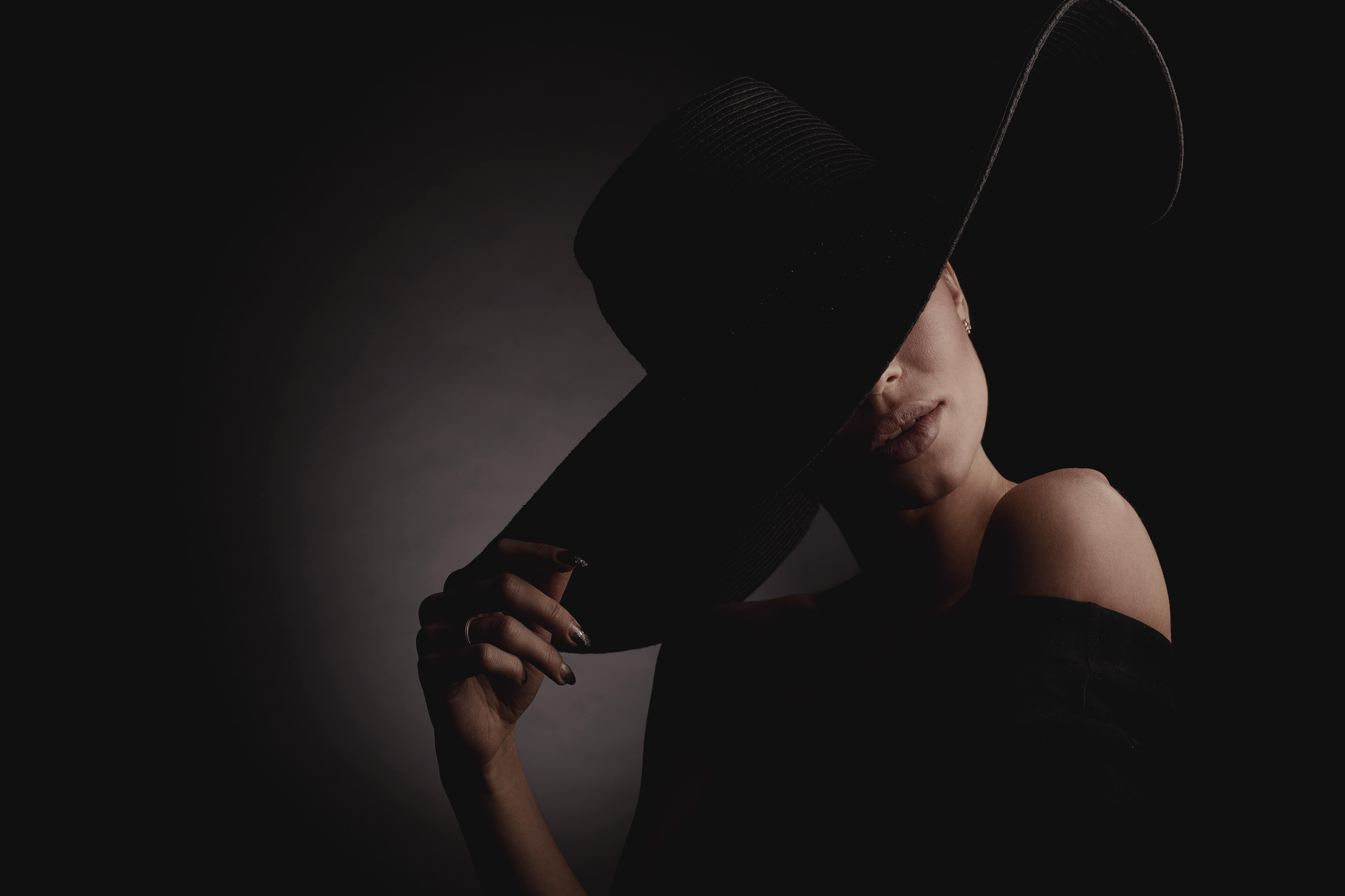 A woman with a hat on her head