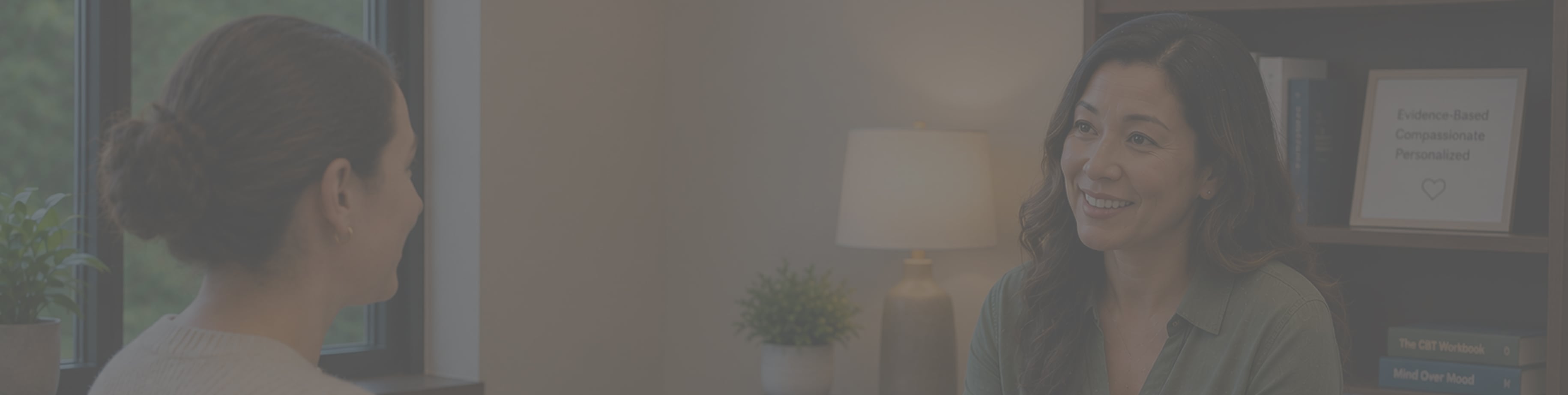 Wide banner photo (dimmed/darkened) of two women in conversation on a couch, overlaid with the text Evidence-Based, Compassionate, Personalized