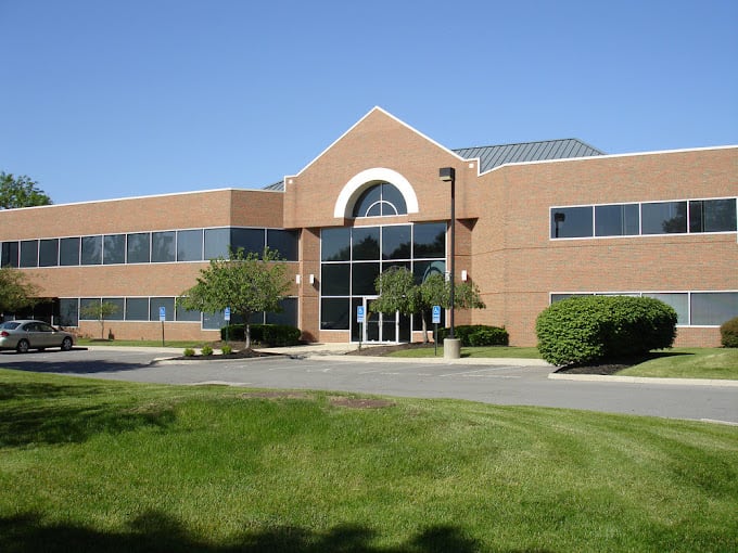 Exterior photo of a two-story brick medical office building, Emerald Psychiatry's Dublin, Ohio location, from a different angle