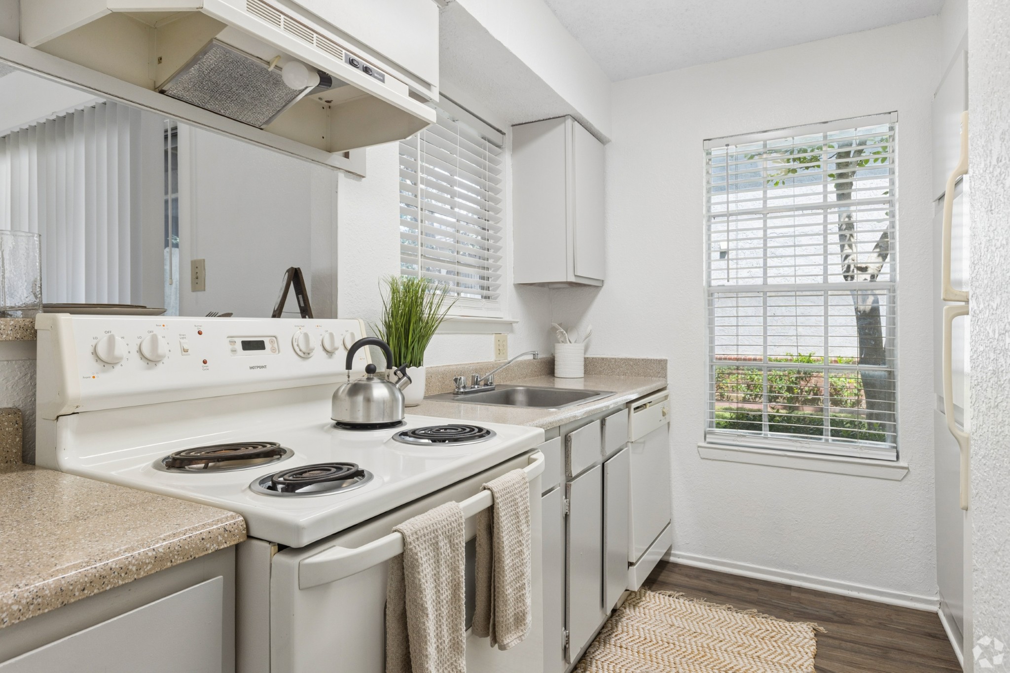 Kitchen at Crestbrook Apartments in Burleson, Texas