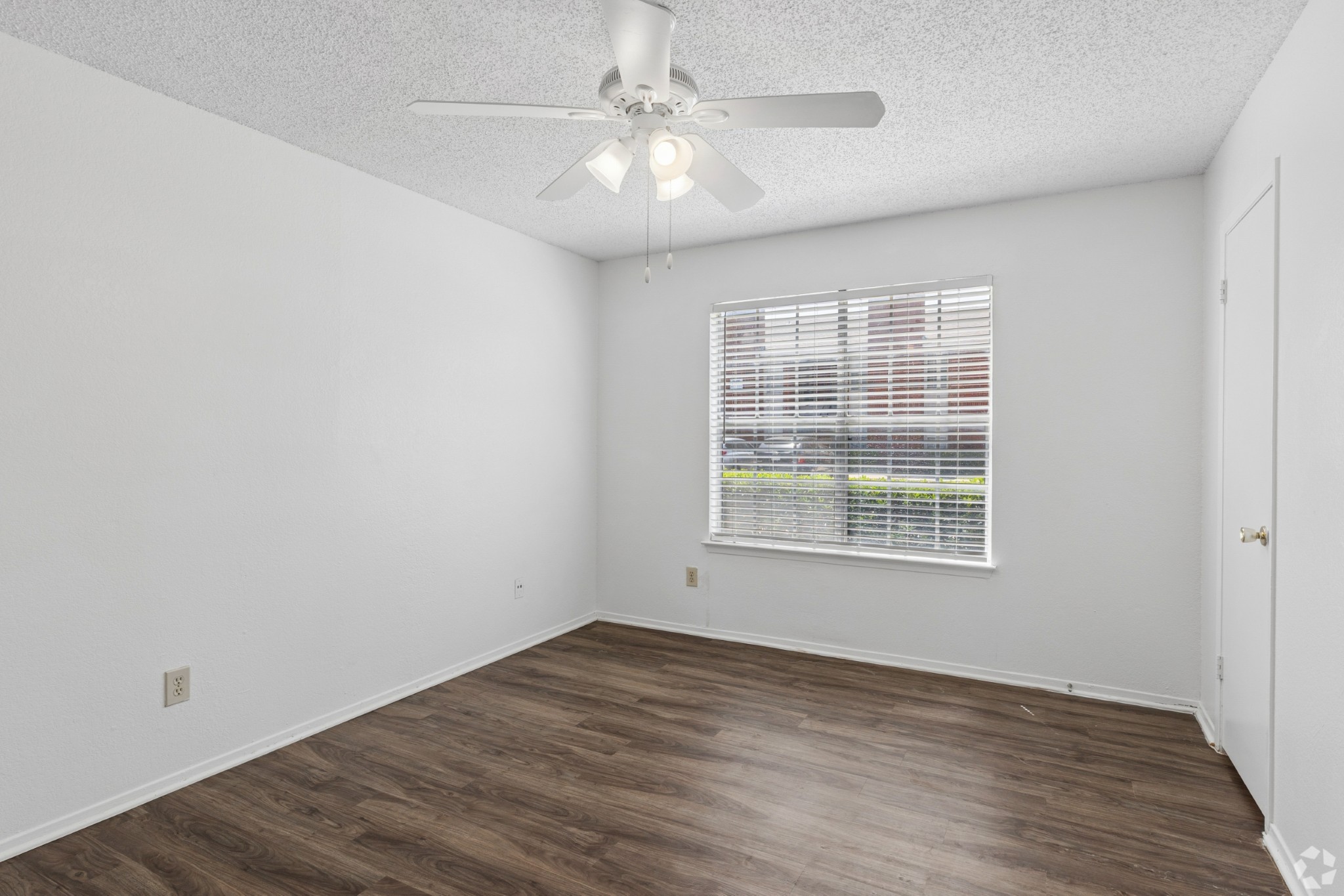 Bedroom at Crestbrook Apartments in Burleson, Texas