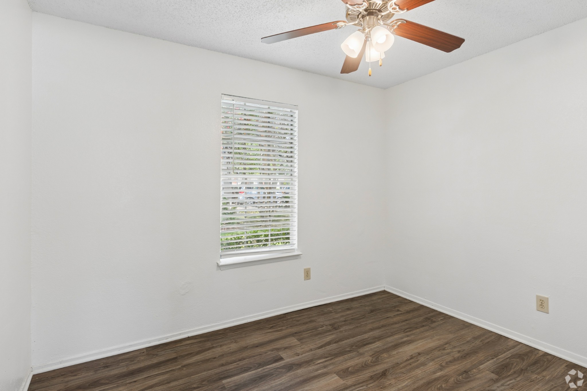 Bedroom at Crestbrook Apartments in Burleson, Texas