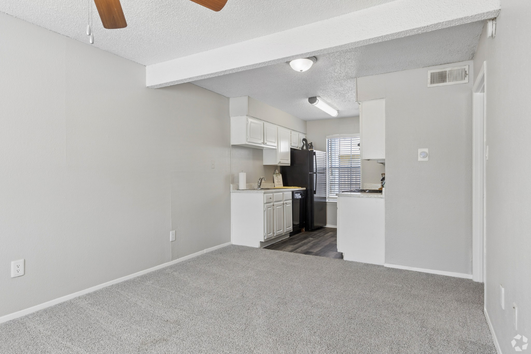 1 Bedroom Living Area at Crestbrook Apartments in Burleson, Texas