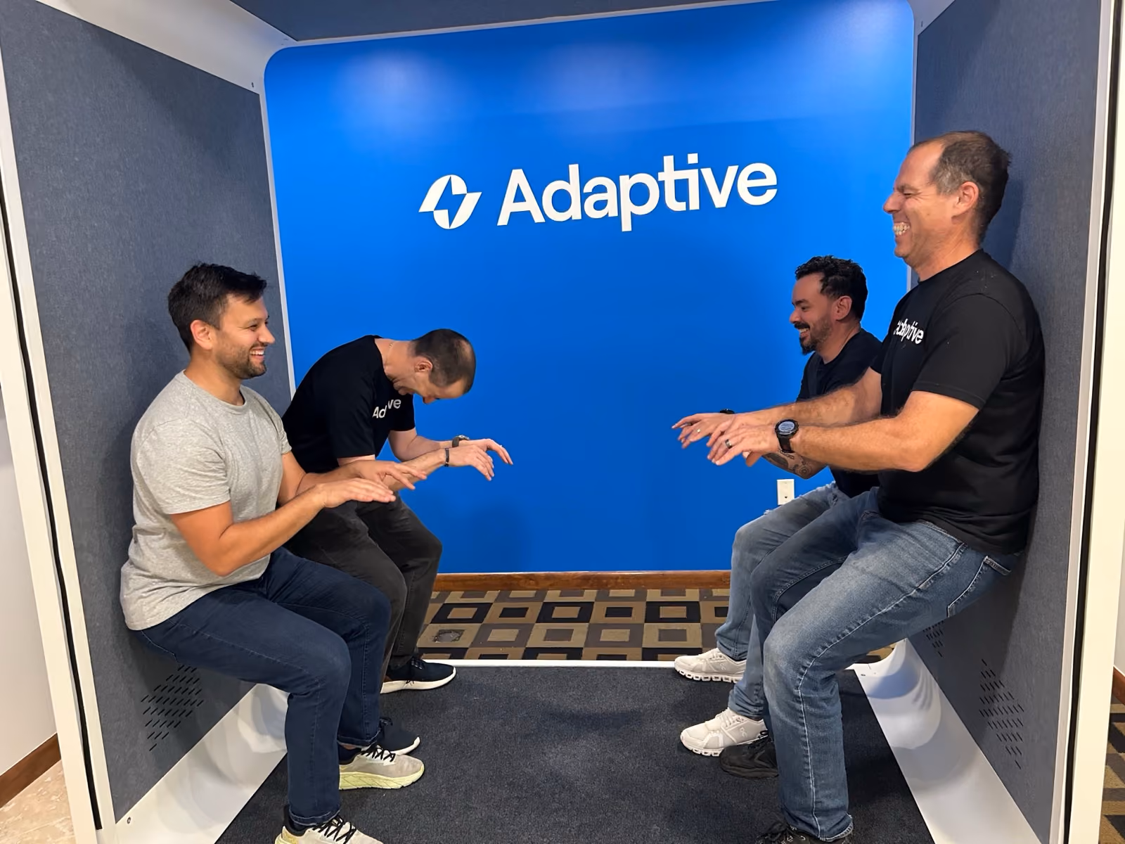 Adaptive team members gathered at the office