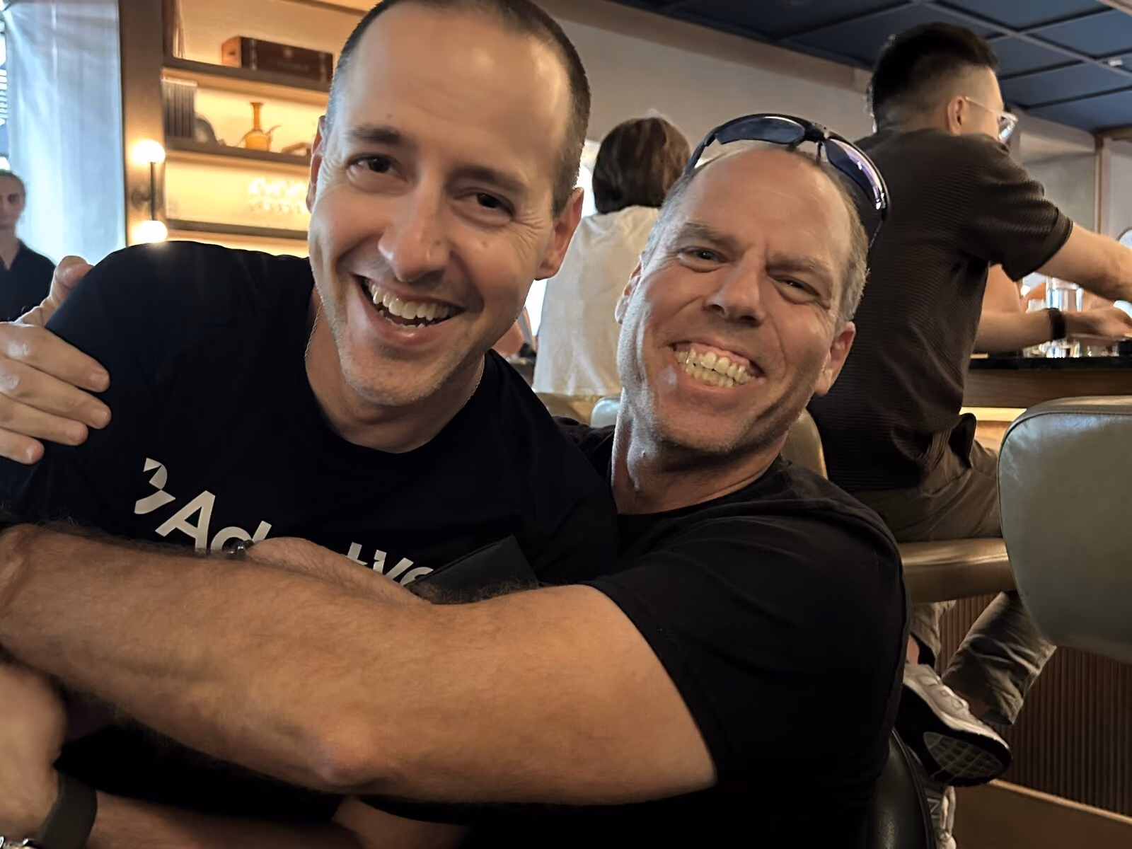 Two Adaptive teammates at a company gathering
