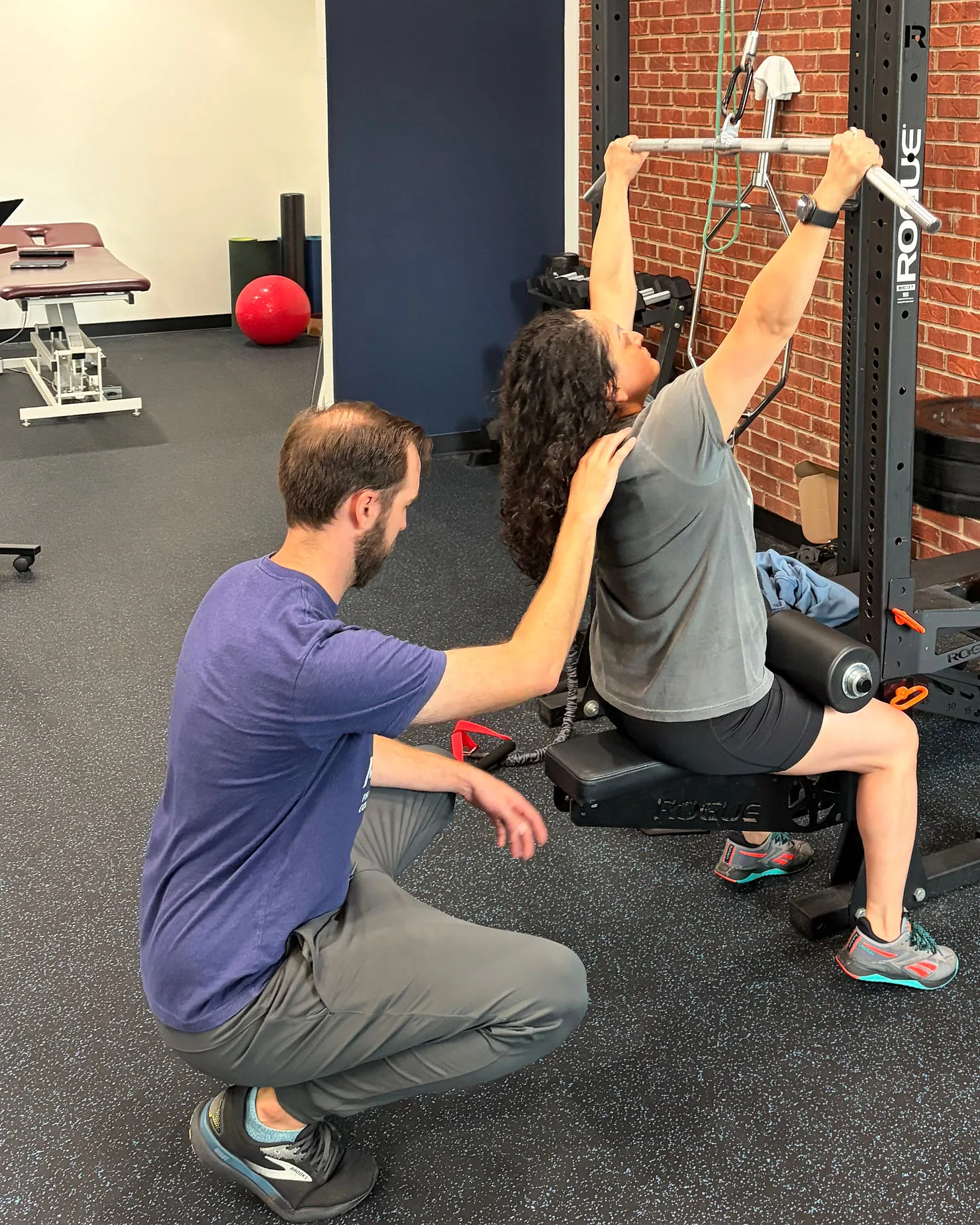 Patient working with a provider at a physical therapy clinic in Arlington, TX