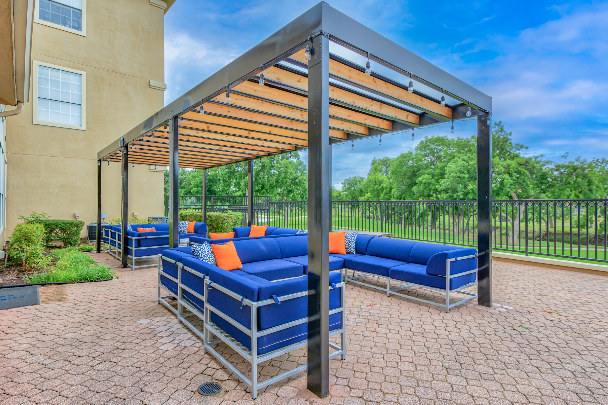 Pool Seating Area in The Fairways at Prestonwood Apartments in Dallas, Texas