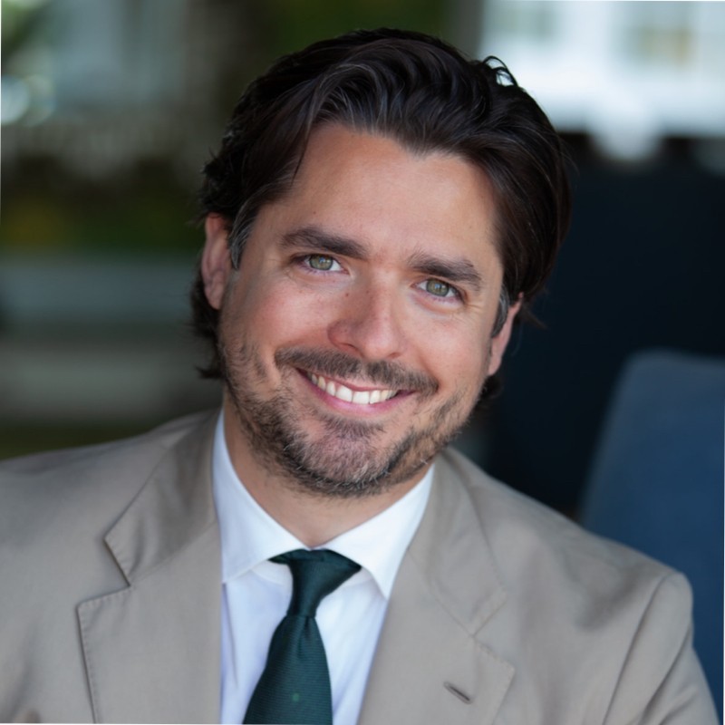 Professional headshot of George Brandes.