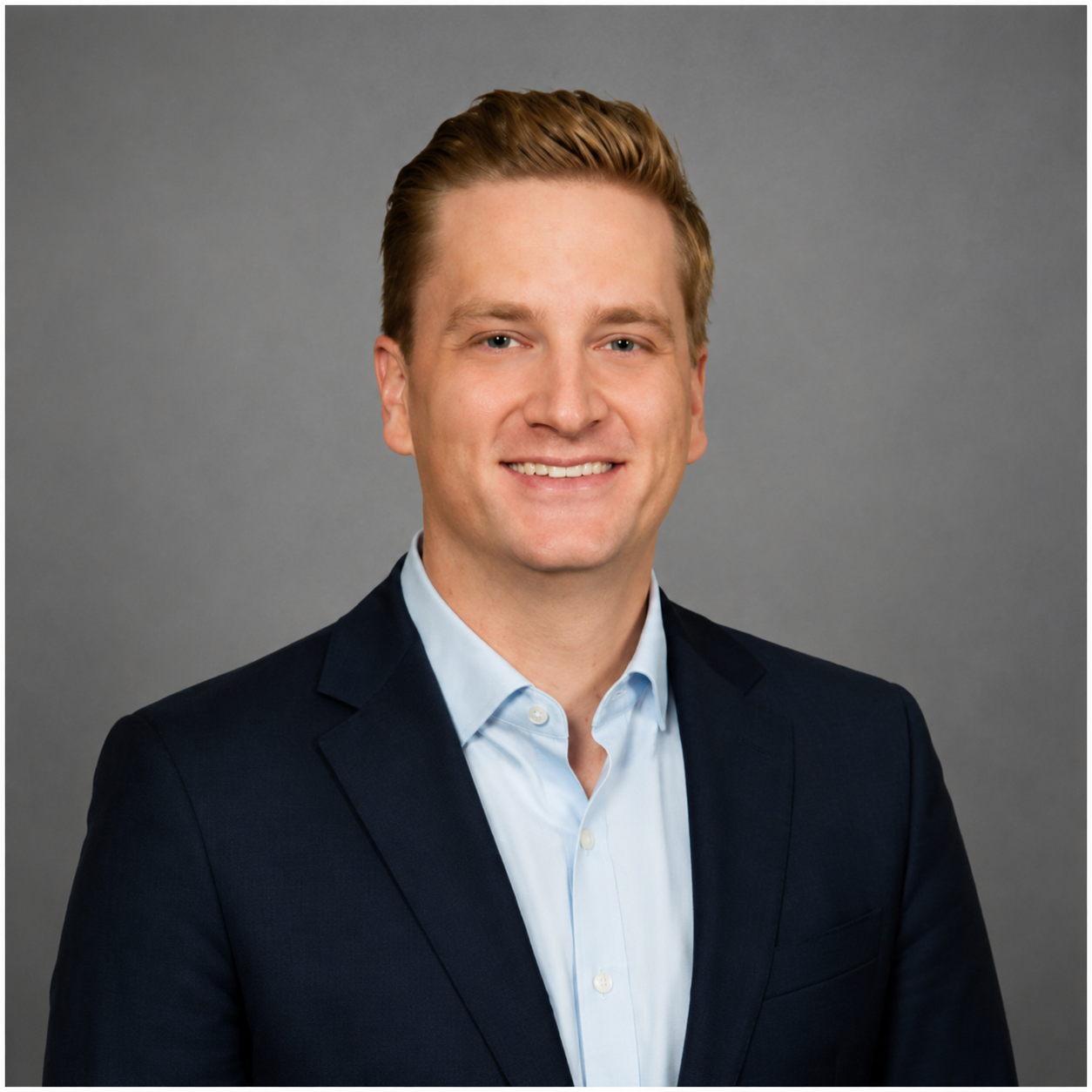 Professional headshot of Andrew Rhea.