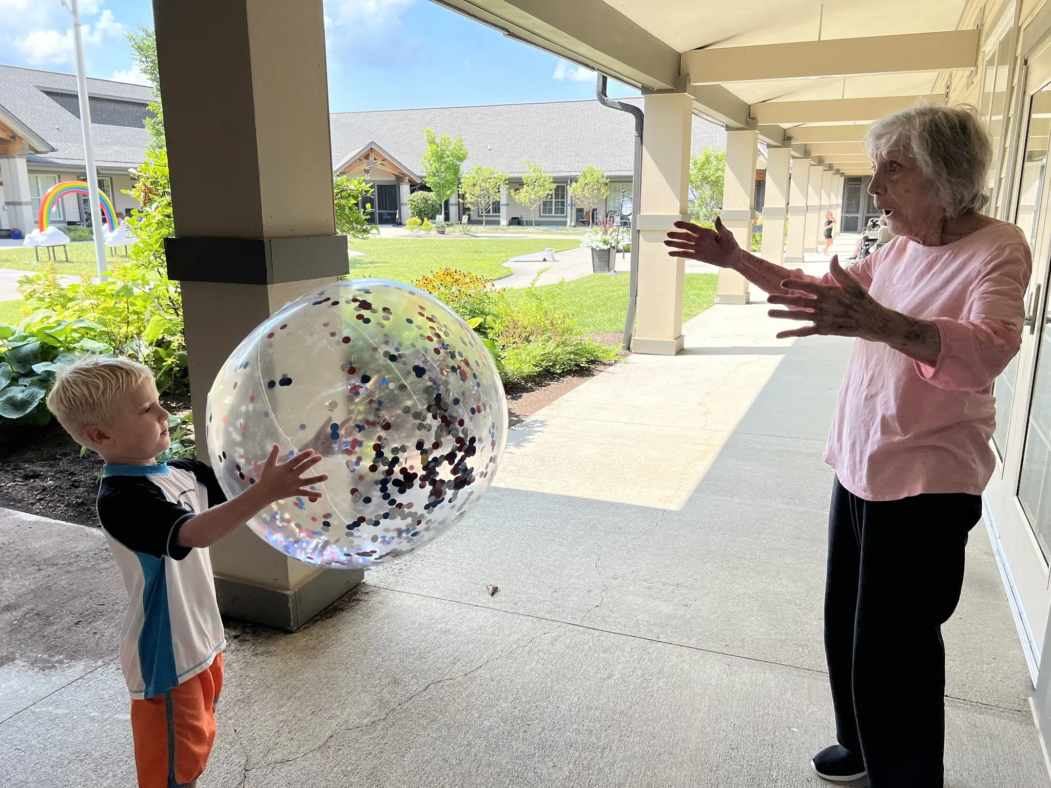 Woman and child playing catch