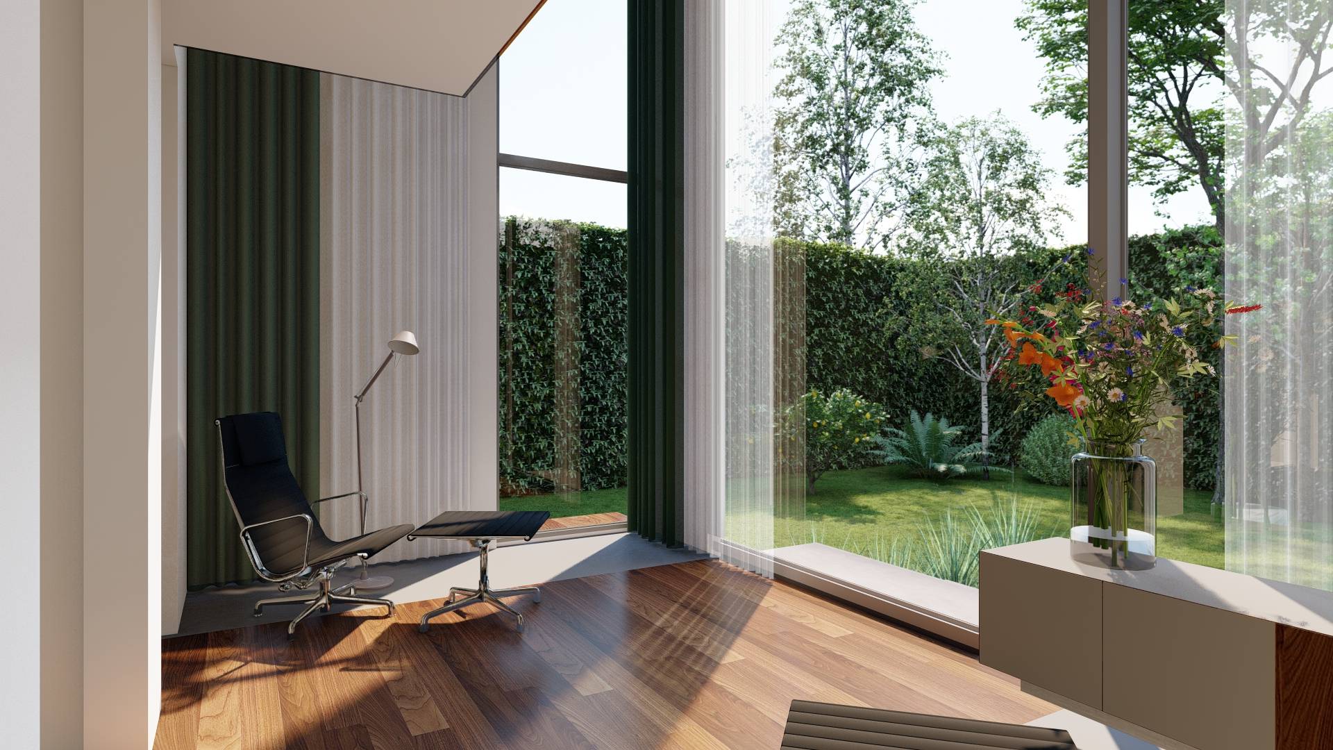 Modern interior space with a black lounge chair and ottoman near large floor-to-ceiling windows overlooking a green garden with trees and bushes, and a vase of colorful flowers on a cabinet.