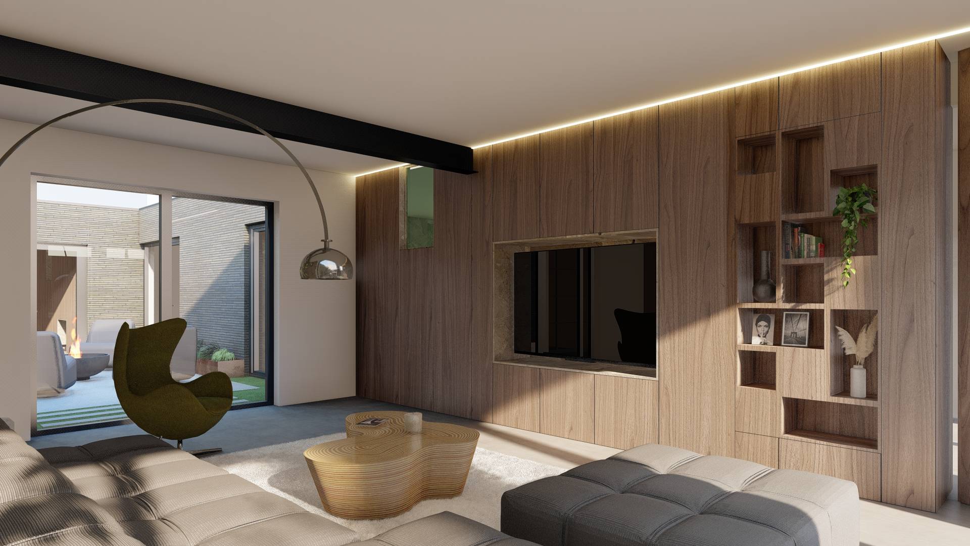 Modern living room with wood-paneled wall featuring built-in shelves, a mounted TV, gray sectional sofa, green accent chair, wood coffee table, and sliding glass door to outdoor patio with fire pit.