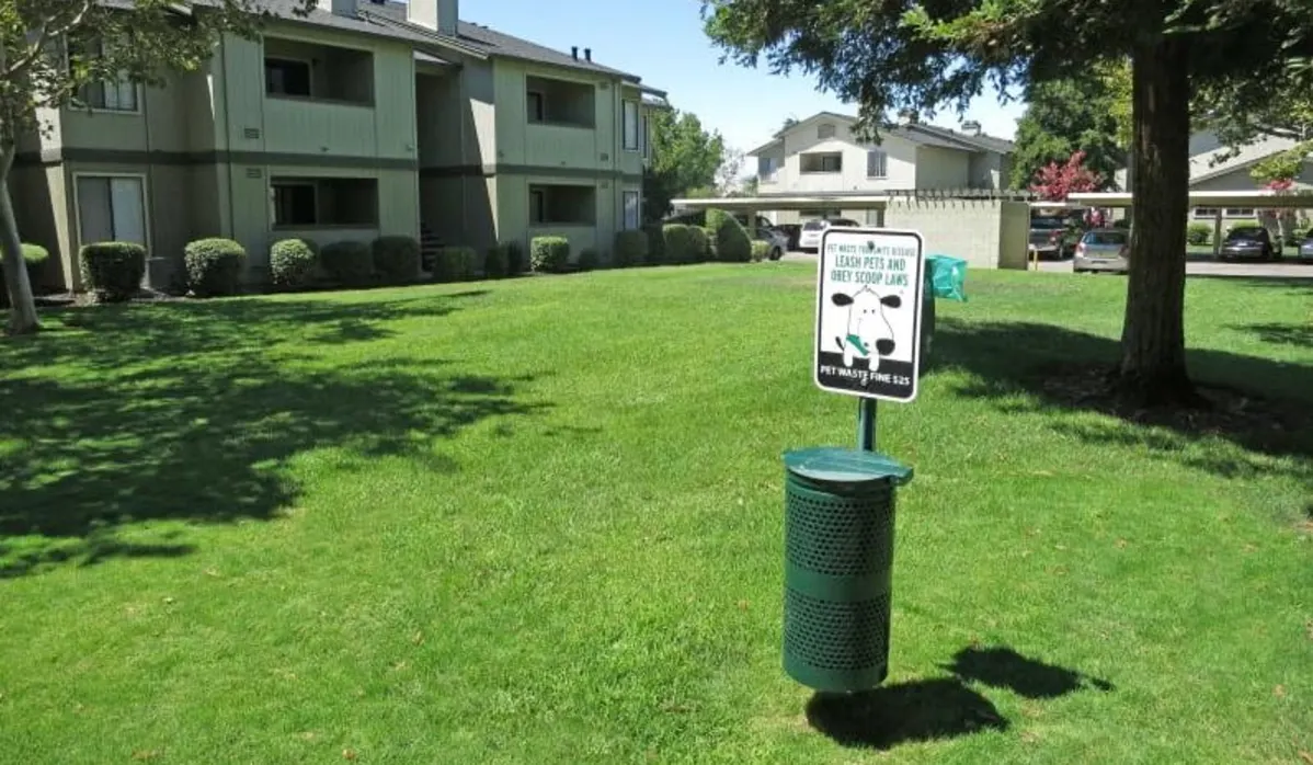 Dog park with waste stations