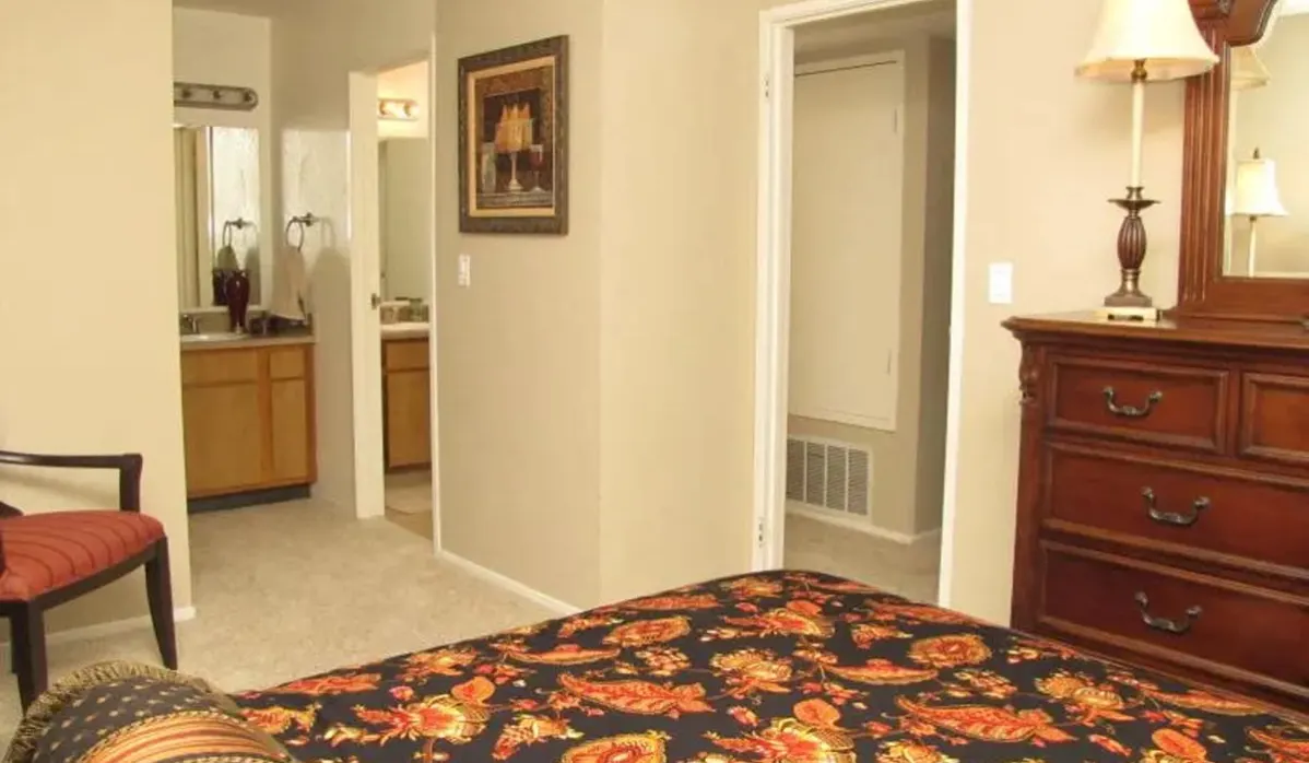 Bedroom with bed and chair