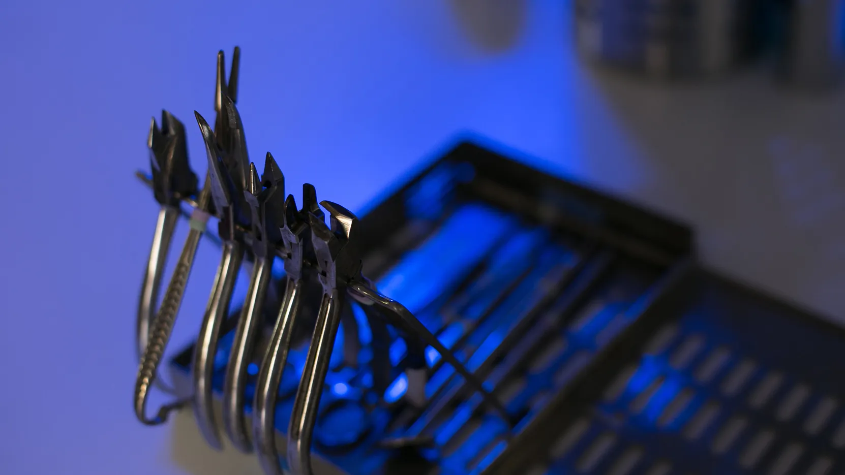 Orthodontic instruments arranged on a treatment tray