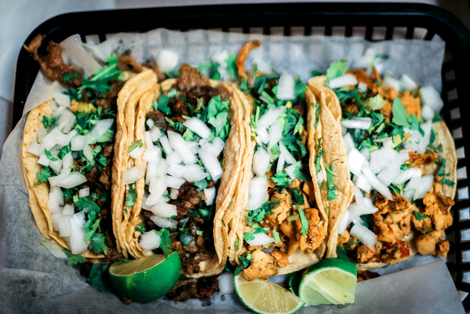Close-up of cooked Mexican food, evoking the taqueria scene of CDMX. Photo by Xavier Crook on Unsplash.