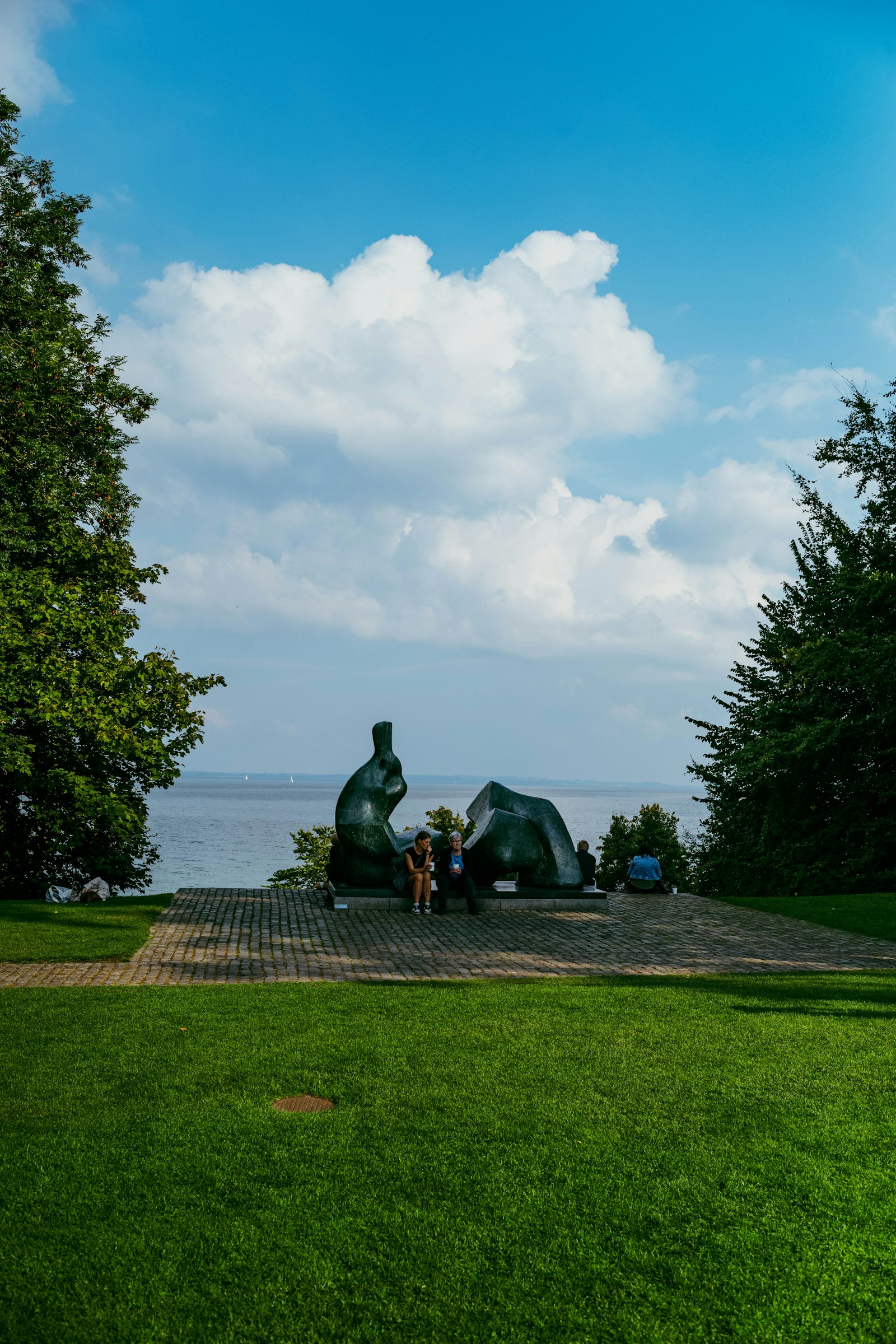 Henry Moore bronzes in Louisiana's sculpture park above the Øresund. Photo by tommao wang on Unsplash.