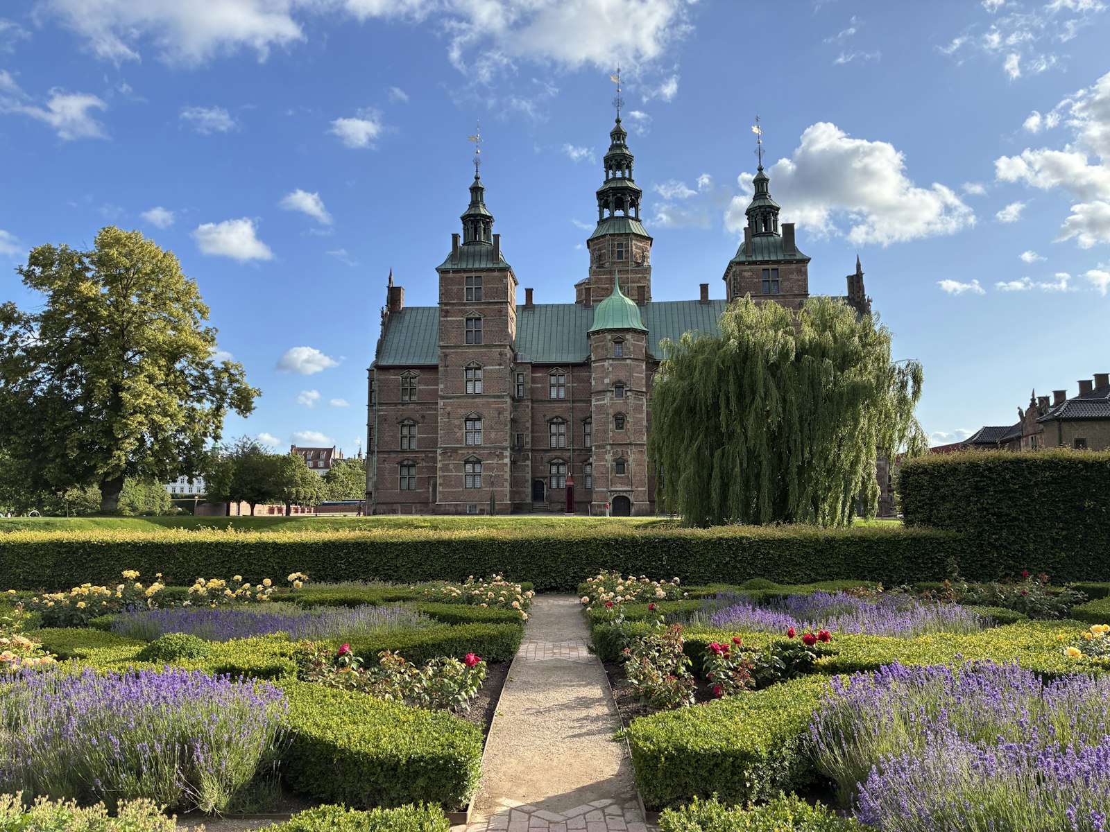 Rosenborg Castle above the flower beds of the King's Garden. Photo by Roger Suen on Unsplash.