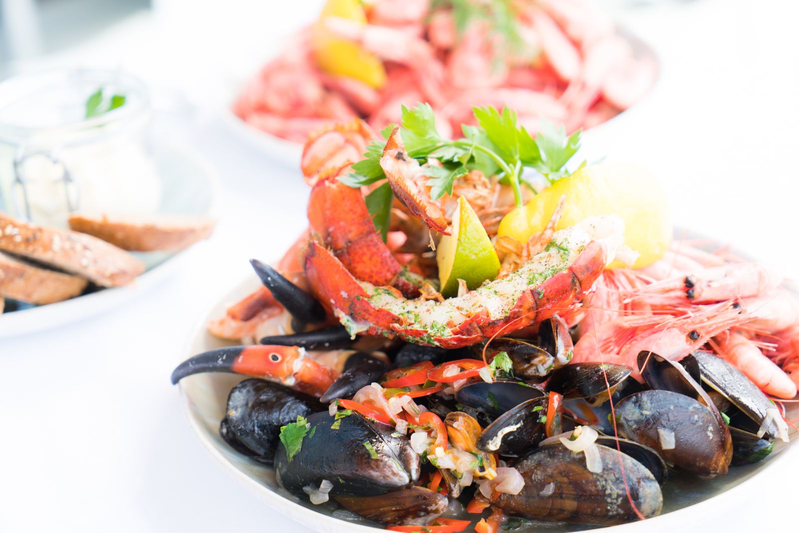 A platter of shellfish of the kind a Lisbon cervejaria sends out all evening. Photo by Terje Sollie on Pexels.
