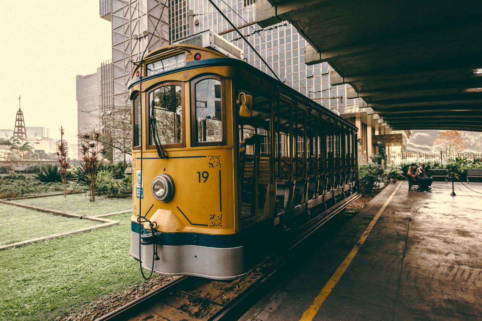 The yellow Santa Teresa tram on its track in Rio. Photo by Jonathan Borba on Pexels.