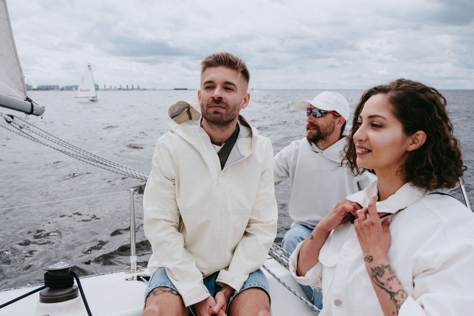 Friends together on a boat out on the water. Photo by cottonbro studio on Pexels.