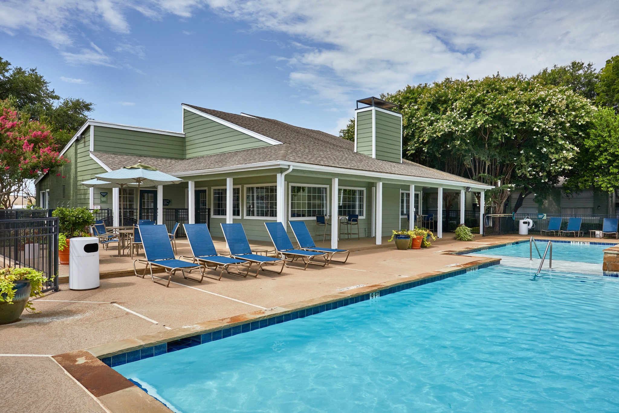 Exterior of community from the pool at Jade Addison Apartments